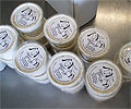 Stacks of packaged Reichert's Dairy Air Cracked Pepper Chèvre